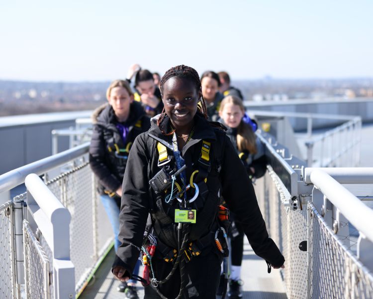 visitors walking up the tottenham hotspur skywalk experience in london