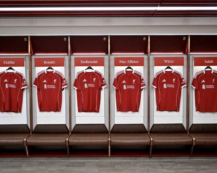 row of shirts in dressing room of liverpool fc stadium tour