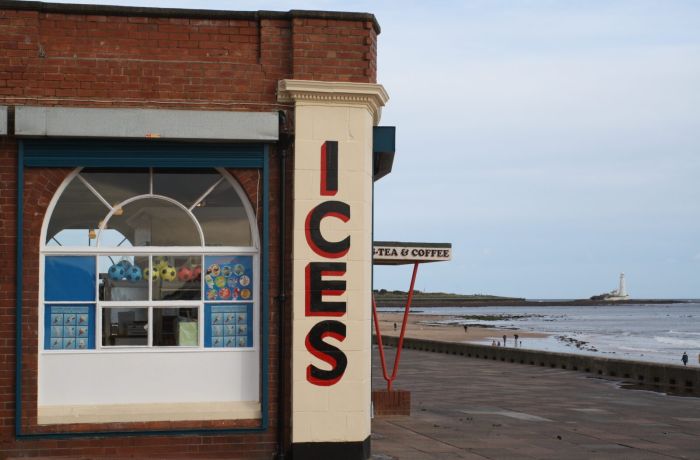 Ice cream shop by coast seen on vera tour