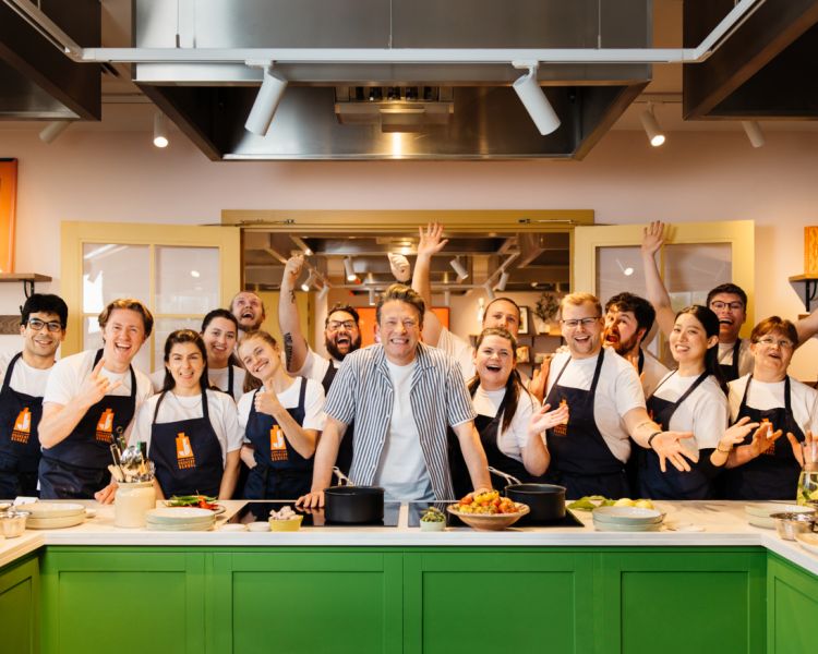 students and jamie oliver at the jamie oliver cookery school
