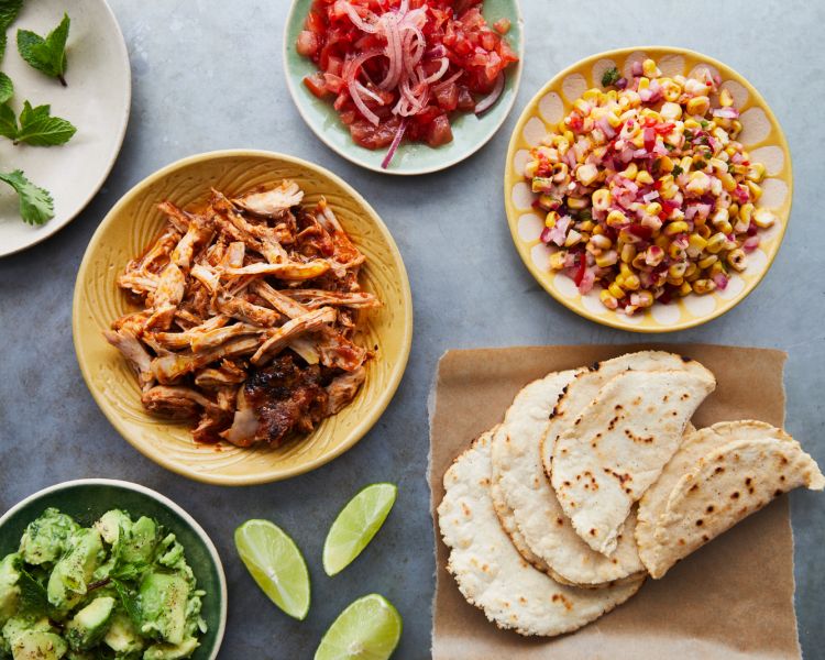 plates of mexican food made at jamie oliver cookery school in london