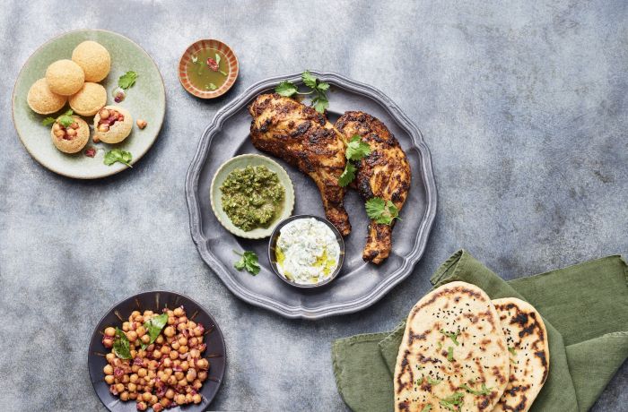 plates of indian street food made at jamie oliver cookery school in london